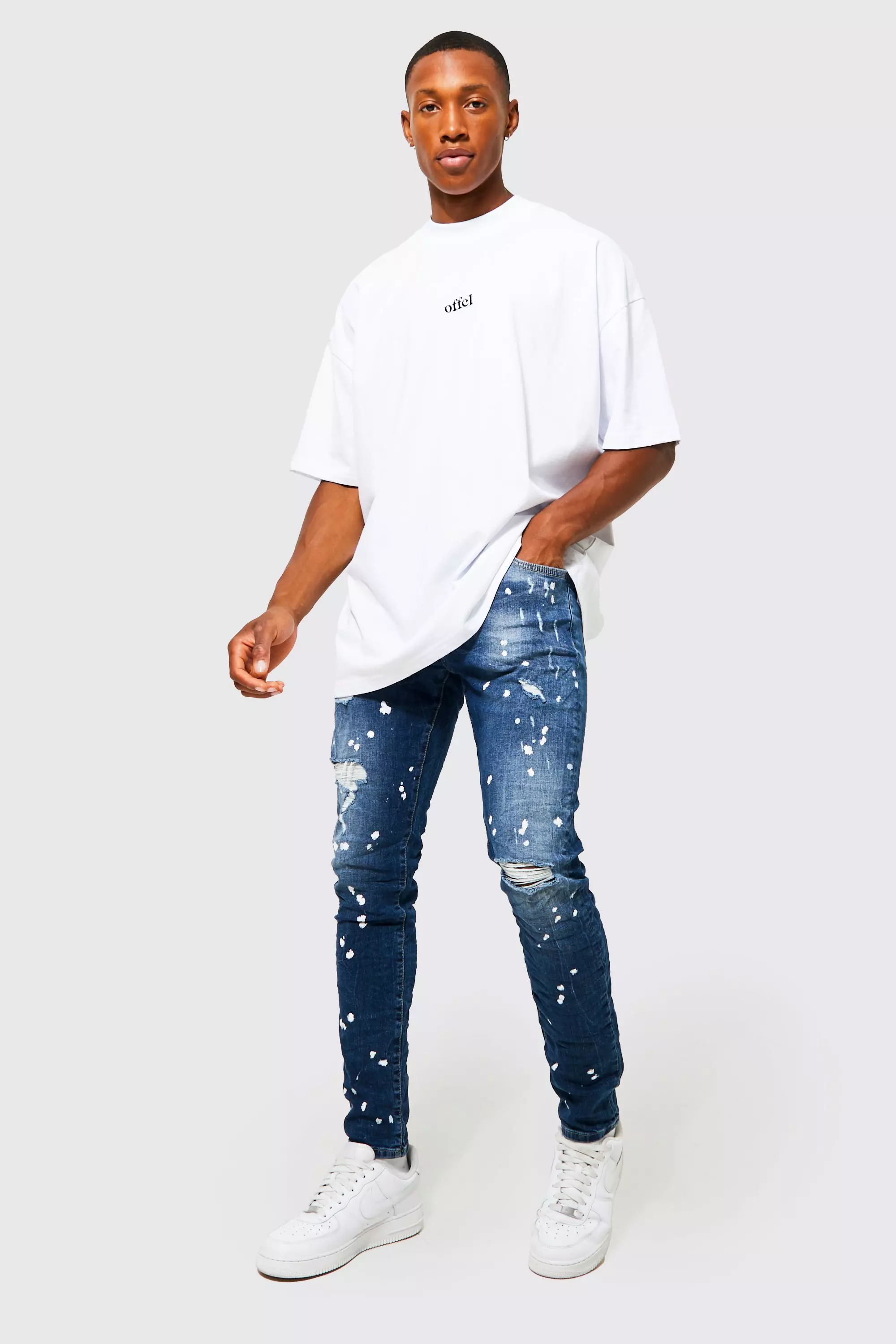 Skinny Ripped Paint Splatter Crinkle Jeans